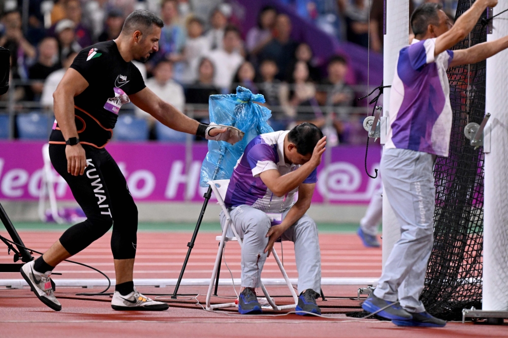 Asian Games official suffers leg fracture after being hit by hammer | The Peninsula Qatar