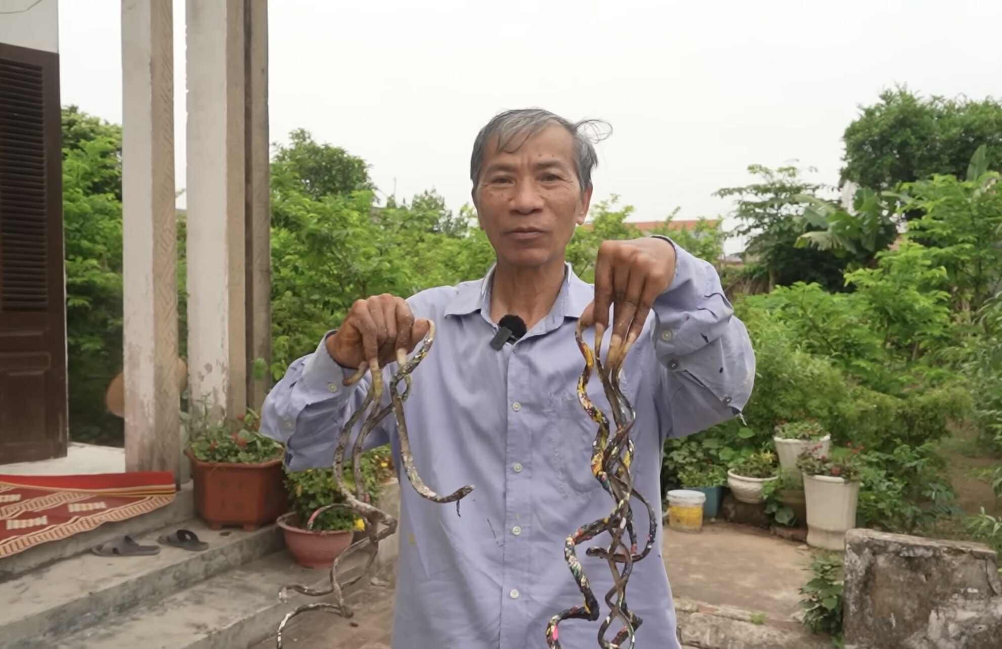 “Dị nhân” Nam Định nuôi móng tay 35 năm không cắt lên tiếng về thông tin muốn bán bộ móng với giá 7 tỷ- Ảnh 1.
