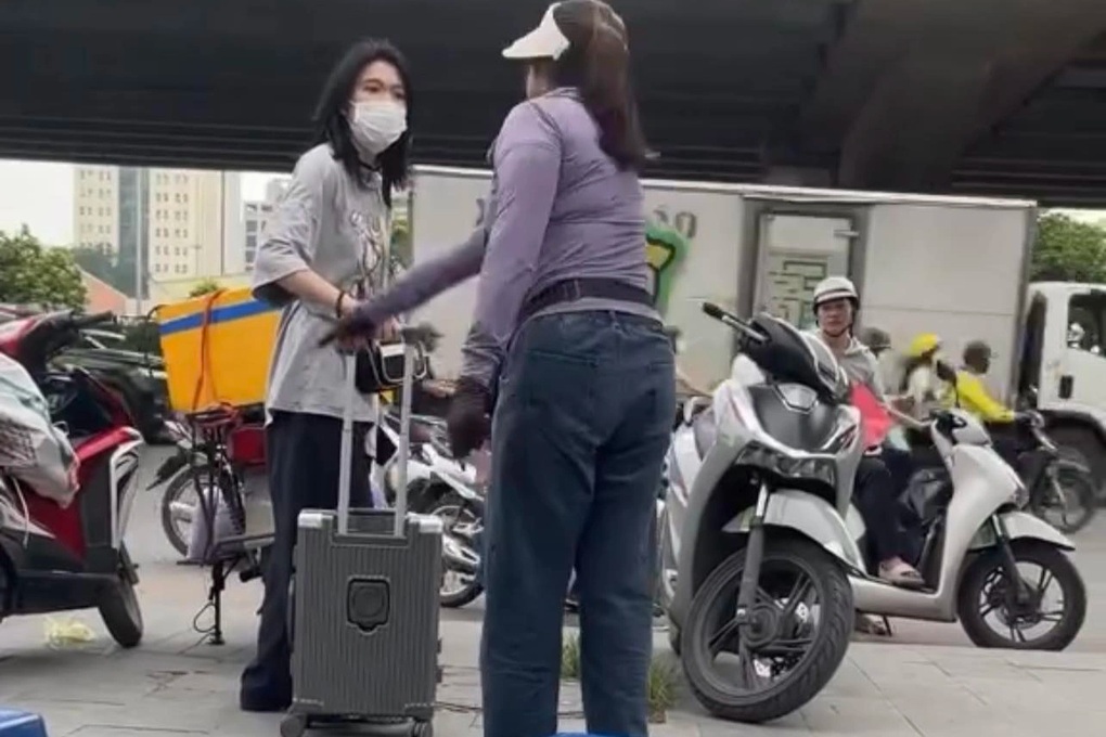 Vụ cô gái bị đuổi khi đứng ở vỉa hè bến xe Mỹ Đình: Phạt người bán trà đá - 1
